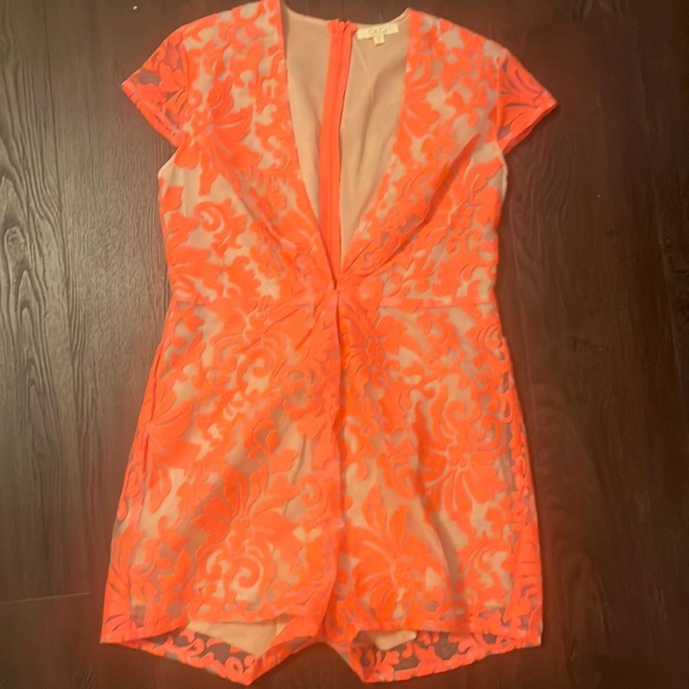Large, pink lace romper